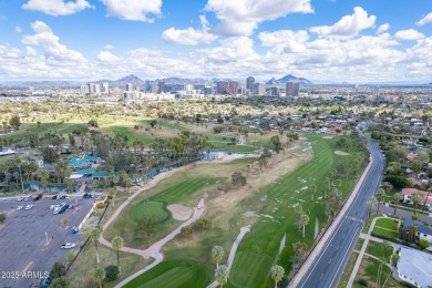 This beautifully updated gem effortlessly fuses timeless 1950s on Encanto 18 Golf Course in Arizona - for sale on GolfHomes.com, golf home, golf lot