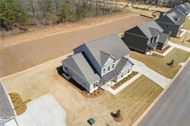 Step into luxury with the beautiful Jamestown model by Paran on Traditions of Braselton Golf Club in Georgia - for sale on GolfHomes.com, golf home, golf lot
