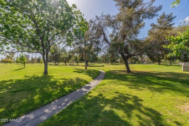 This beautifully updated gem effortlessly fuses timeless 1950s on Encanto 18 Golf Course in Arizona - for sale on GolfHomes.com, golf home, golf lot