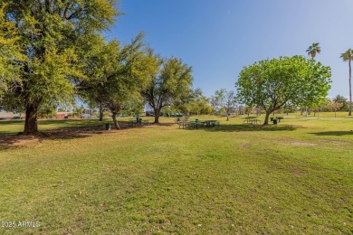 This beautifully updated gem effortlessly fuses timeless 1950s on Encanto 18 Golf Course in Arizona - for sale on GolfHomes.com, golf home, golf lot