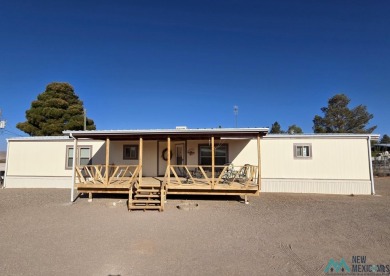 Adorable 3-Bedroom, 2-Bath Home - Walk to the Marina! Curb on Sierra Del Rio Golf Club in New Mexico - for sale on GolfHomes.com, golf home, golf lot