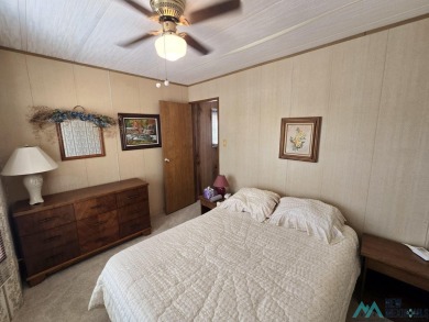 Adorable 3-Bedroom, 2-Bath Home - Walk to the Marina! Curb on Sierra Del Rio Golf Club in New Mexico - for sale on GolfHomes.com, golf home, golf lot