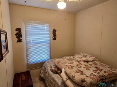 Adorable 3-Bedroom, 2-Bath Home - Walk to the Marina! Curb on Sierra Del Rio Golf Club in New Mexico - for sale on GolfHomes.com, golf home, golf lot