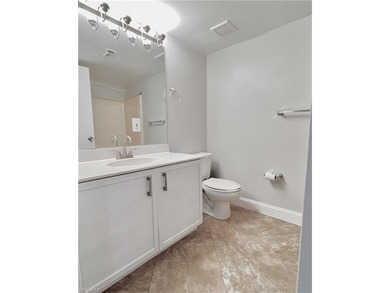 Centrally located condo offers comfort and style in every detail on Quail Run Golf Club In Naples in Florida - for sale on GolfHomes.com, golf home, golf lot