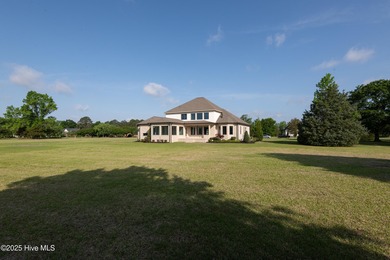 There is also a bonus room ideal for a home theater, playroom on Ironwood Golf and Country Club in North Carolina - for sale on GolfHomes.com, golf home, golf lot
