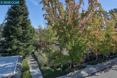 A lovely Sequoia Wrap rebuilt 12 years ago. Sunny open deck on Rossmoor Golf Course in California - for sale on GolfHomes.com, golf home, golf lot