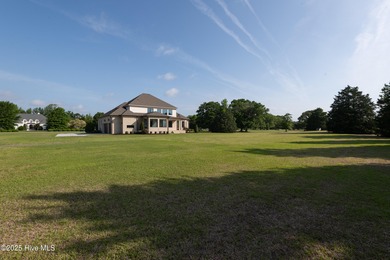 There is also a bonus room ideal for a home theater, playroom on Ironwood Golf and Country Club in North Carolina - for sale on GolfHomes.com, golf home, golf lot