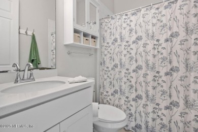 Step into effortless elegance in this beautifully appointed on Amelia National Golf and Country Club in Florida - for sale on GolfHomes.com, golf home, golf lot
