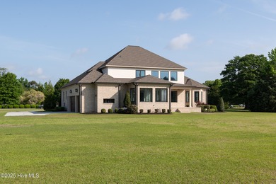 There is also a bonus room ideal for a home theater, playroom on Ironwood Golf and Country Club in North Carolina - for sale on GolfHomes.com, golf home, golf lot