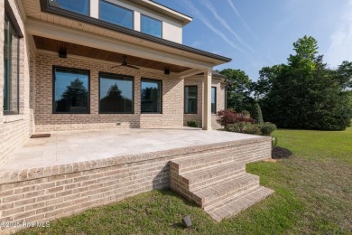 Luxury, craftsmanship, and privacy converge at 541 White Horse on Ironwood Golf and Country Club in North Carolina - for sale on GolfHomes.com, golf home, golf lot