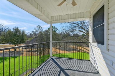 Nestled in a prime location near the front gate, this on Lake Kiowa Golf Course in Texas - for sale on GolfHomes.com, golf home, golf lot