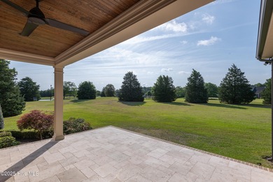 There is also a bonus room ideal for a home theater, playroom on Ironwood Golf and Country Club in North Carolina - for sale on GolfHomes.com, golf home, golf lot