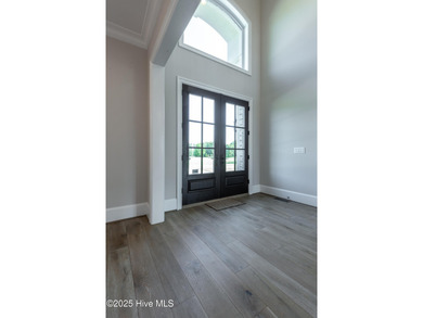 There is also a bonus room ideal for a home theater, playroom on Ironwood Golf and Country Club in North Carolina - for sale on GolfHomes.com, golf home, golf lot