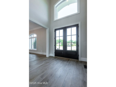 Luxury, craftsmanship, and privacy converge at 541 White Horse on Ironwood Golf and Country Club in North Carolina - for sale on GolfHomes.com, golf home, golf lot