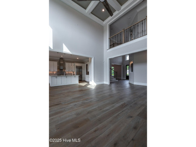 There is also a bonus room ideal for a home theater, playroom on Ironwood Golf and Country Club in North Carolina - for sale on GolfHomes.com, golf home, golf lot