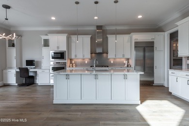 There is also a bonus room ideal for a home theater, playroom on Ironwood Golf and Country Club in North Carolina - for sale on GolfHomes.com, golf home, golf lot