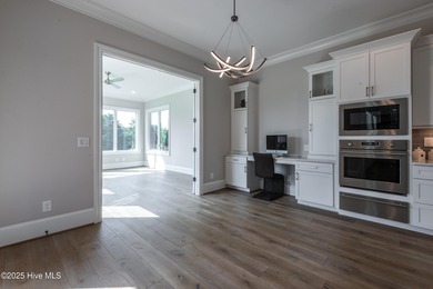 There is also a bonus room ideal for a home theater, playroom on Ironwood Golf and Country Club in North Carolina - for sale on GolfHomes.com, golf home, golf lot