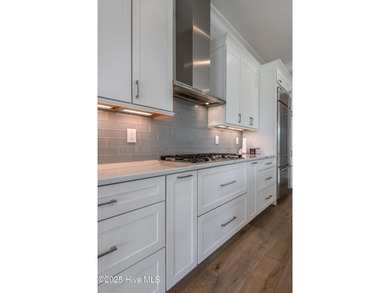 There is also a bonus room ideal for a home theater, playroom on Ironwood Golf and Country Club in North Carolina - for sale on GolfHomes.com, golf home, golf lot