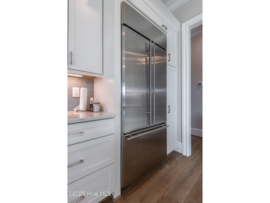 There is also a bonus room ideal for a home theater, playroom on Ironwood Golf and Country Club in North Carolina - for sale on GolfHomes.com, golf home, golf lot