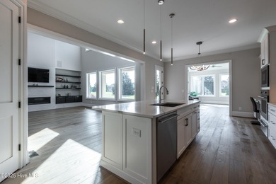 There is also a bonus room ideal for a home theater, playroom on Ironwood Golf and Country Club in North Carolina - for sale on GolfHomes.com, golf home, golf lot