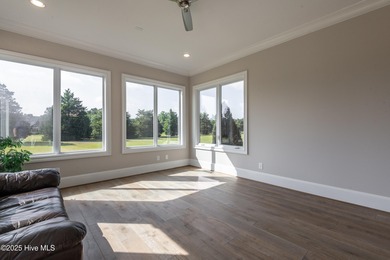 There is also a bonus room ideal for a home theater, playroom on Ironwood Golf and Country Club in North Carolina - for sale on GolfHomes.com, golf home, golf lot