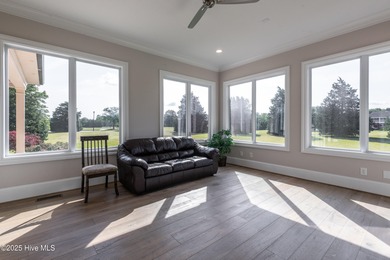 There is also a bonus room ideal for a home theater, playroom on Ironwood Golf and Country Club in North Carolina - for sale on GolfHomes.com, golf home, golf lot