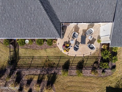 Enjoy maintenance-free coastal living in the premier gated on Members Club At St. James Plantation in North Carolina - for sale on GolfHomes.com, golf home, golf lot