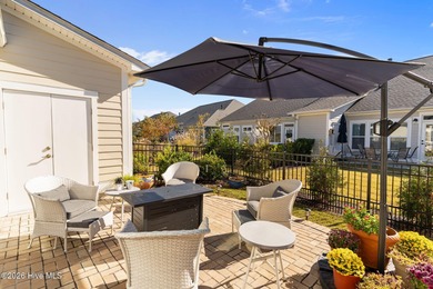 Enjoy maintenance-free coastal living in the premier gated on Members Club At St. James Plantation in North Carolina - for sale on GolfHomes.com, golf home, golf lot