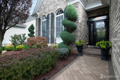 Brick front Monaco boasts a '10' for curb appeal. From the on Regency At Monroe Golf and Country Club in New Jersey - for sale on GolfHomes.com, golf home, golf lot