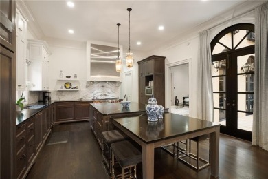 Stunning European-style home on over 1.7 acres of gated, fully on Bobby Jones Golf Club in Georgia - for sale on GolfHomes.com, golf home, golf lot