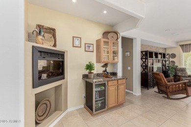 This popular Gala model in Sun City Festival is perfectly on Copper Canyon Golf Club in Arizona - for sale on GolfHomes.com, golf home, golf lot