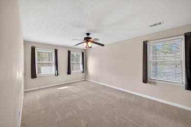 Nestled in the desirable Houndslake neighborhood, this inviting on Houndslake Country Club in South Carolina - for sale on GolfHomes.com, golf home, golf lot