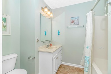 This spacious 4 LARGE Bedroom 4 Bath raised beach house is just on Prestwick Country Club in South Carolina - for sale on GolfHomes.com, golf home, golf lot