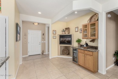 This popular Gala model in Sun City Festival is perfectly on Copper Canyon Golf Club in Arizona - for sale on GolfHomes.com, golf home, golf lot