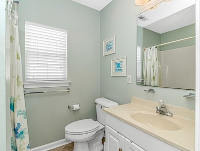 This spacious 4 LARGE Bedroom 4 Bath raised beach house is just on Prestwick Country Club in South Carolina - for sale on GolfHomes.com, golf home, golf lot