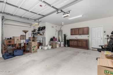 This popular Gala model in Sun City Festival is perfectly on Copper Canyon Golf Club in Arizona - for sale on GolfHomes.com, golf home, golf lot