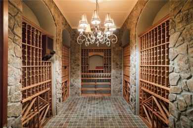Stunning European-style home on over 1.7 acres of gated, fully on Bobby Jones Golf Club in Georgia - for sale on GolfHomes.com, golf home, golf lot