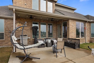 Life at 2212 Brooks Trail is defined by ease, energy, and access on Heath Golf and Yacht Club in Texas - for sale on GolfHomes.com, golf home, golf lot