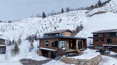 Indulge in the ultimate mountain retreat with this fully on Snake River Sporting Club in Wyoming - for sale on GolfHomes.com, golf home, golf lot