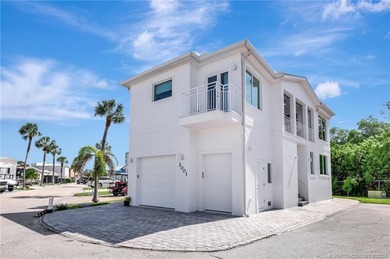 This stunning two-story custom-built home offers breathtaking on Island Dunes Country Club in Florida - for sale on GolfHomes.com, golf home, golf lot