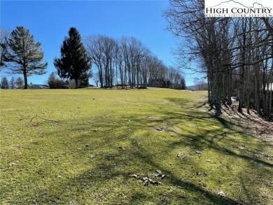 Great laying wooded lot overlooking the Beech Mountain Club golf on Beech Mountain Club in North Carolina - for sale on GolfHomes.com, golf home, golf lot