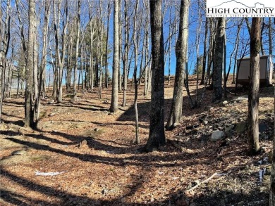 Great laying wooded lot overlooking the Beech Mountain Club golf on Beech Mountain Club in North Carolina - for sale on GolfHomes.com, golf home, golf lot