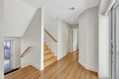 This stunning two-story custom-built home offers breathtaking on Island Dunes Country Club in Florida - for sale on GolfHomes.com, golf home, golf lot