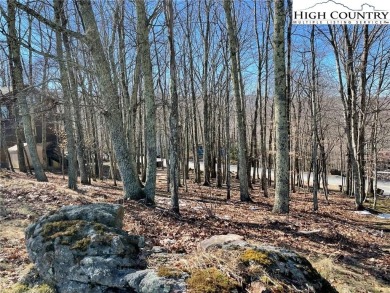 Great laying wooded lot overlooking the Beech Mountain Club golf on Beech Mountain Club in North Carolina - for sale on GolfHomes.com, golf home, golf lot