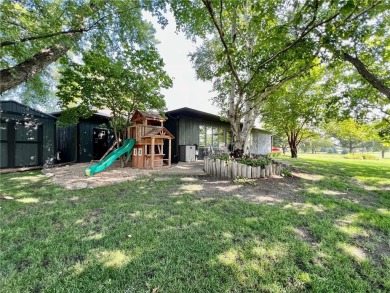 The updated three bedroom three bathroom home on Rita Road is on Ortonville Muni Golf Course in Minnesota - for sale on GolfHomes.com, golf home, golf lot