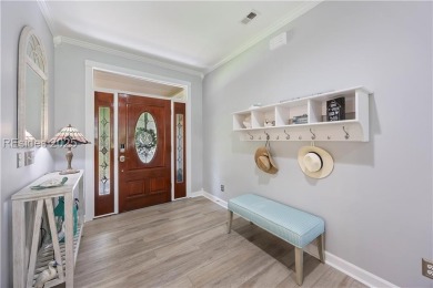 Discover refined Lowcountry living in this beautifully updated on Palmetto Hall Golf Course in South Carolina - for sale on GolfHomes.com, golf home, golf lot