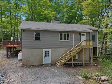 Fully remodeled 4-Bedroom Home in Tanglwood Lakes with Lake on Paupack Hills Golf and Country Club in Pennsylvania - for sale on GolfHomes.com, golf home, golf lot