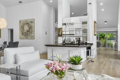 Step into modern elegance and timeless comfort with this on Bocaire Country Club in Florida - for sale on GolfHomes.com, golf home, golf lot