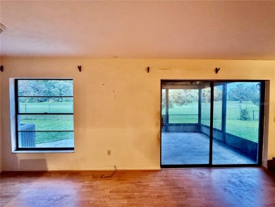 Come see this 3-bedroom 2-bathroom 2 car garage block home on Babe Zaharias Golf Course in Florida - for sale on GolfHomes.com, golf home, golf lot