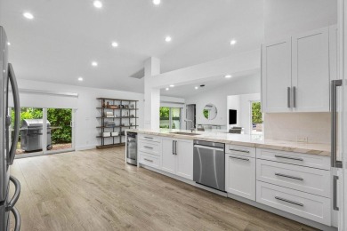 Step into modern elegance and timeless comfort with this on Bocaire Country Club in Florida - for sale on GolfHomes.com, golf home, golf lot